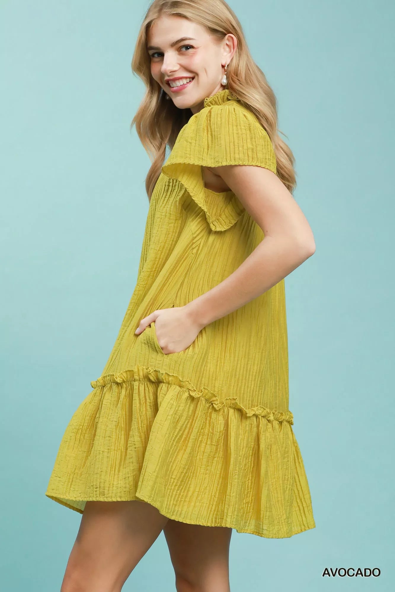Textured ruffle hem mini dress by Umgee, featuring a stylish and flowy silhouette, perfect for casual or semi-formal occasions.