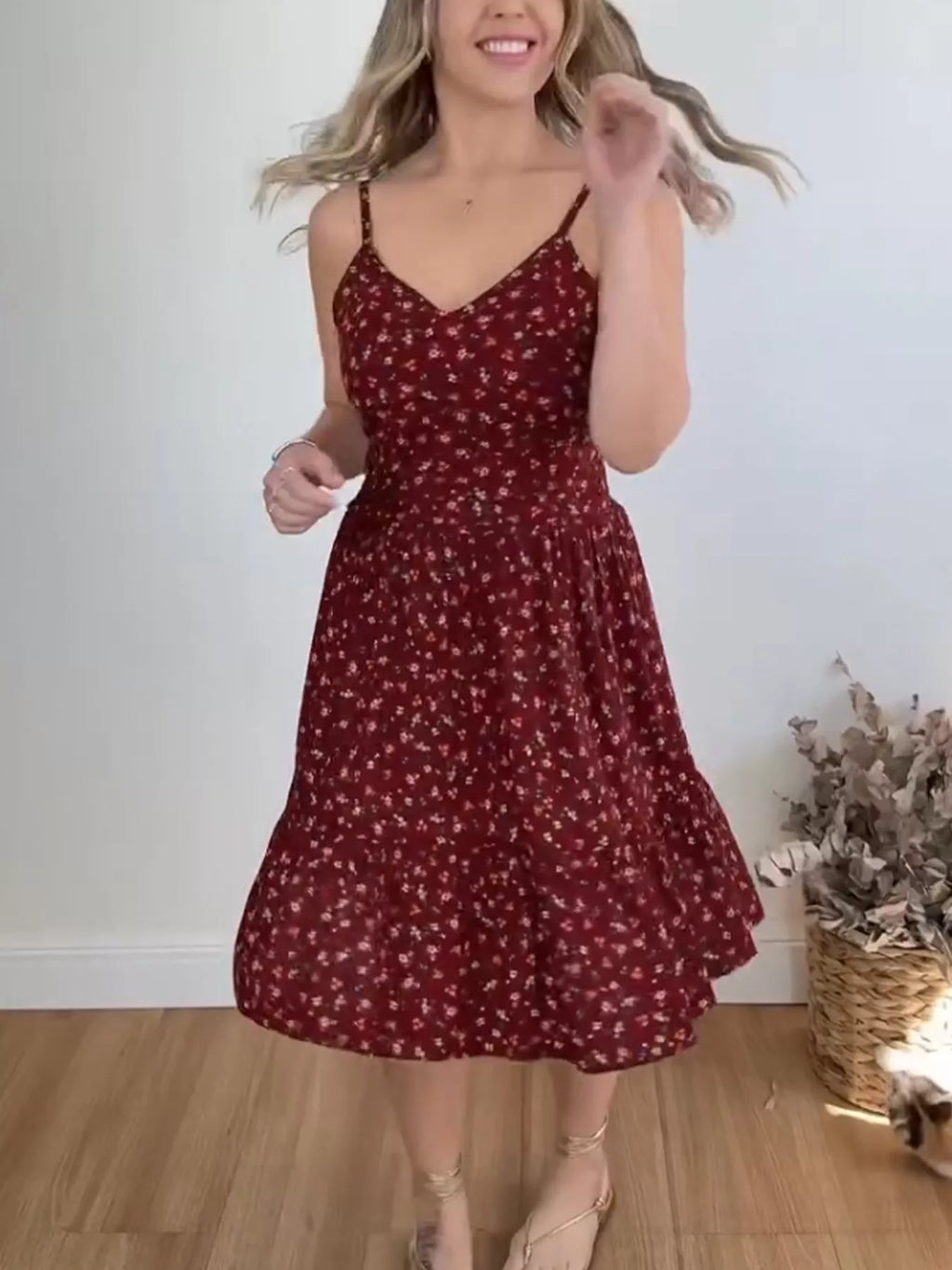 Floral print spaghetti strap midi dress with ruffle hem, trendy women's dress by Trendsi, lightweight and stylish for summer.