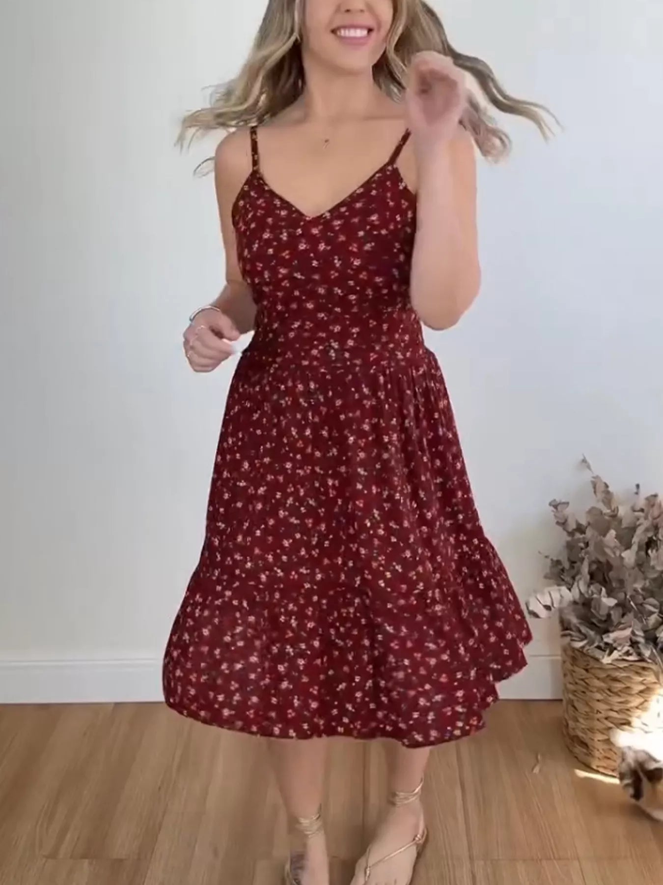 Floral print spaghetti strap midi dress with ruffle hem, trendy women's dress by Trendsi, lightweight and stylish for summer.