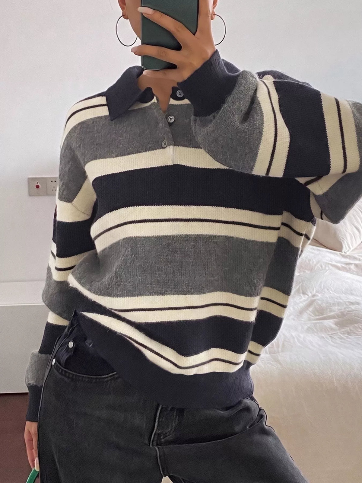 Striped long sleeve sweater by Plush Fashion Hub featuring button details and a cozy, casual fit.