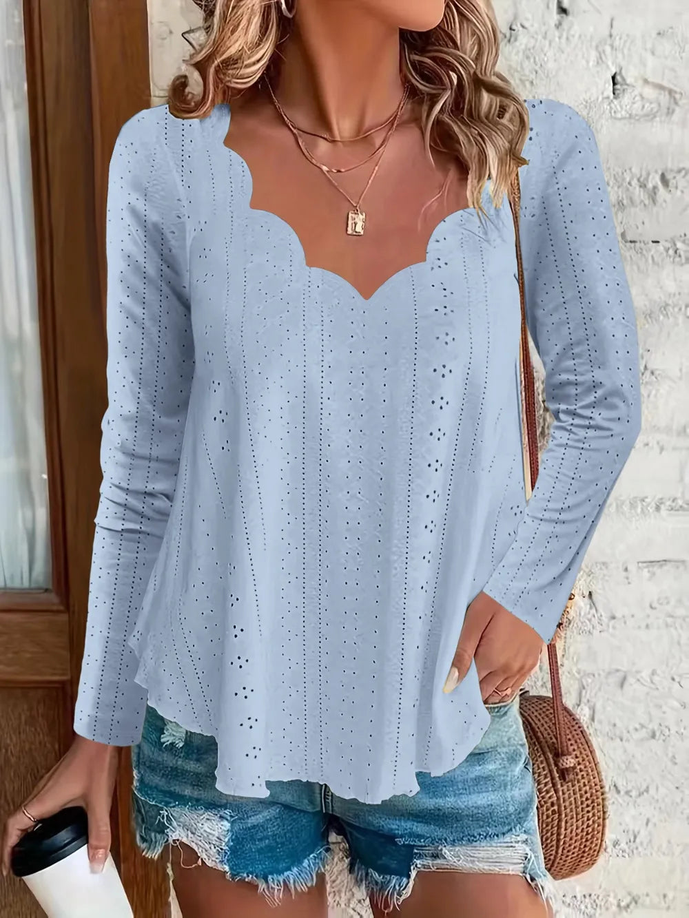 Elegant women's eyelet long sleeve blouse by Plush Fashion Hub, featuring a versatile, stretchy office top with eyelet details.