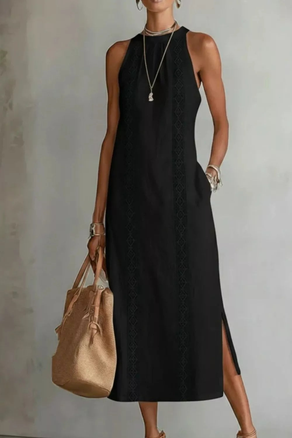 Women's sleeveless side slit maxi dress with pockets by Plush Fashion Hub, featuring a flowing design and stylish slit detail.