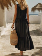 Plus size sleeveless maxi dress with zipper front, pocket, ruffle hem by Shopimist, perfect for casual summer wear.