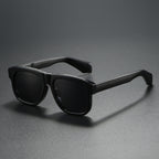 Unisex acetate-style polarized fashion sunglasses with a luxury look, featuring dark tinted lenses and stylish frame design.
