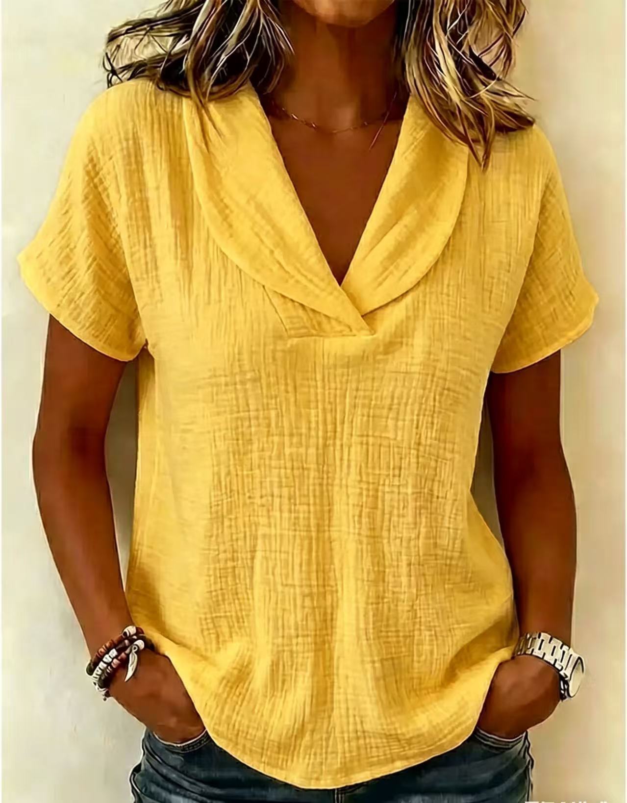 Women's knitted short-sleeve butterfly collar top by Plush Fashion Hub, casualwear with a delicate butterfly design and soft knit fabric.