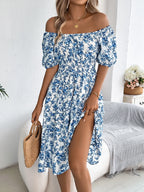 Shopimist floral puff sleeve dress with ruffled hem, featuring a feminine design and vibrant flower pattern.