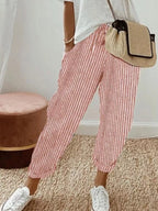 Striped cropped pants by Shopimist featuring a stylish, fitted design with bold horizontal stripes and a high-rise waist.