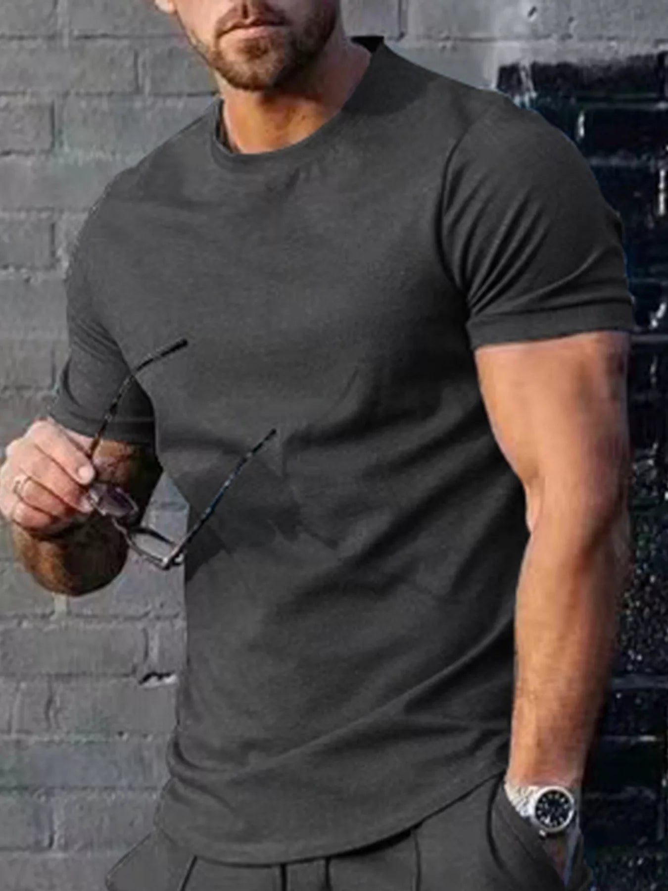 Men's plus size casual T-shirt in solid color, Trendsi brand, displayed as a comfortable, everyday tops option.