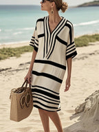 Plus size women's striped half-sleeve midi dress by Plush Fashion Hub, casual chic apparel for everyday wear.