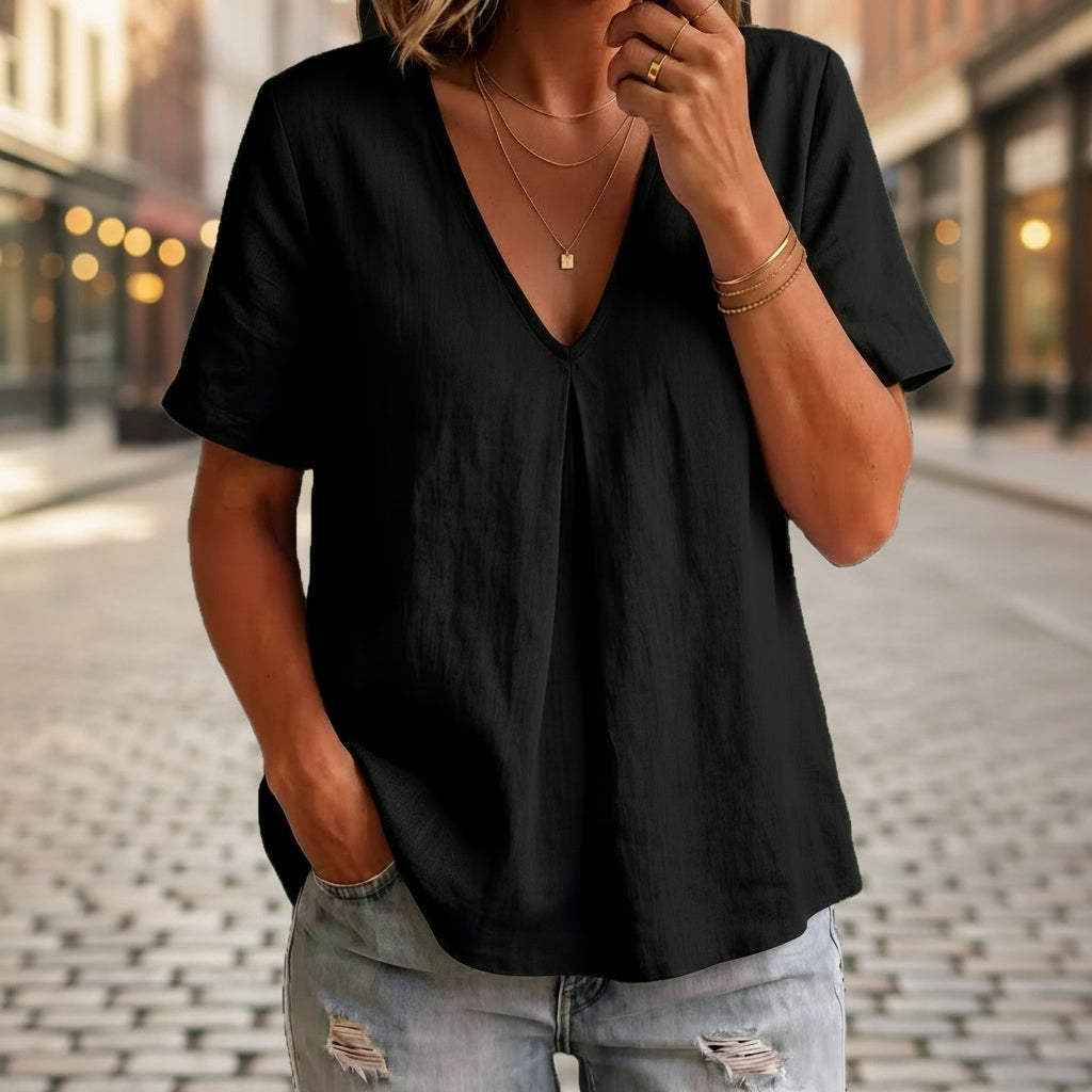 Women's pleated cotton-linen short-sleeve shirt by FitiqueFit, shown in five colors, featuring a relaxed fit and stylish design.