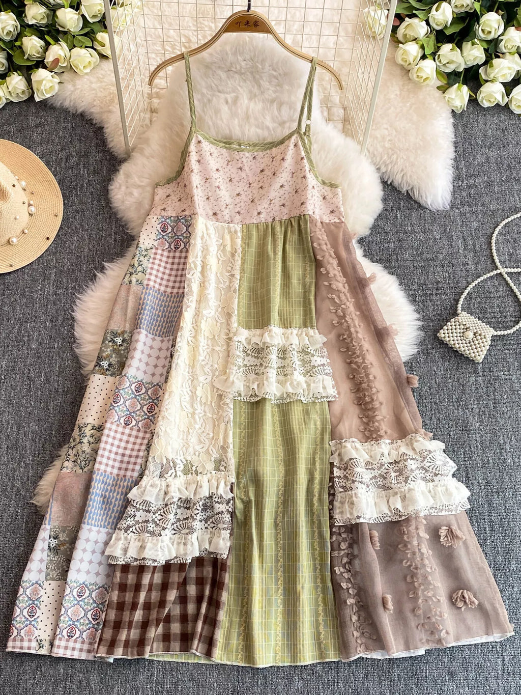 Boho patchwork lace-trimmed A-line tiered dress with bohemian style and layered fabric details, perfect for casual or summer wear.