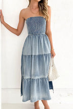VYSN smocked tube slit tiered denim dress featuring a fitted bodice, tiered skirt, and stylish denim fabric.