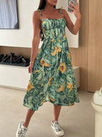 Women's striped tie-shoulder midi dress by Trendsi, casual summer brunch dress with a relaxed fit and stylish design.