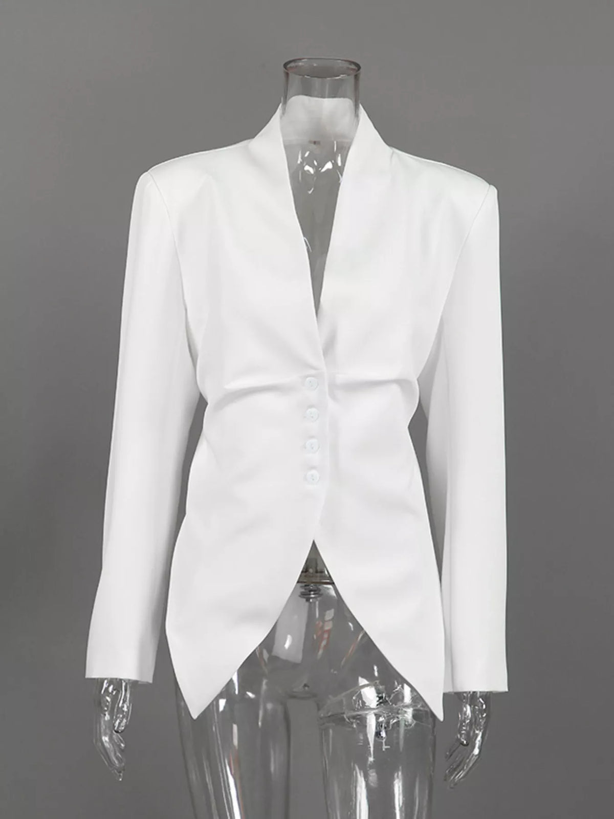 Slim-fit asymmetric hem blazer by Trendsi, tailored fit with stylish uneven hem, shown on a model.