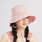 Elegant wide brim straw sun hat by Trendsi, perfect for summer beach vacations, with a stylish and breathable design.