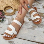 Open toe Plush Fashion Hub flats sandals with a sleek design, featuring comfortable straps and a stylish look for casual wear.
