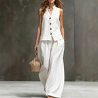 Women's sleeveless cotton linen vest and wide-leg pants two-piece set by FitiqueFit, featuring a relaxed fit and neutral colors.