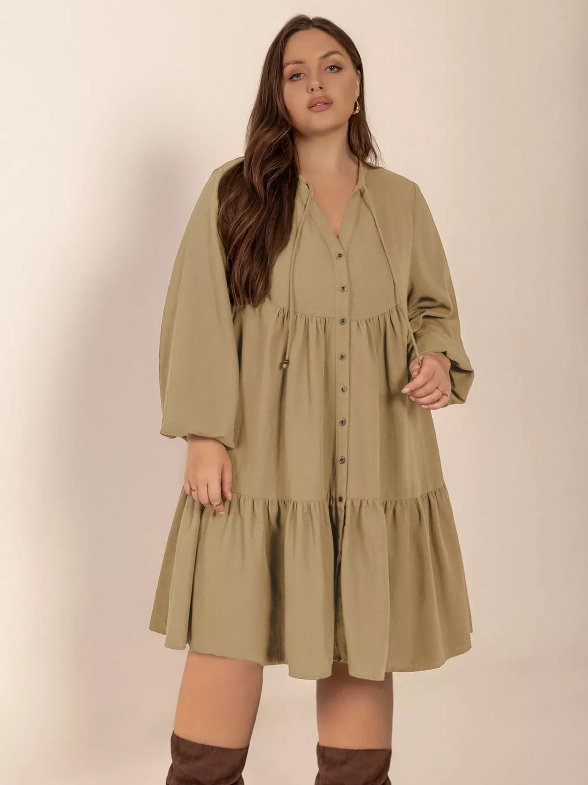 Plus size tie neck balloon sleeve dress by Plush Fashion Hub featuring a stylish, flowing silhouette and elegant design.