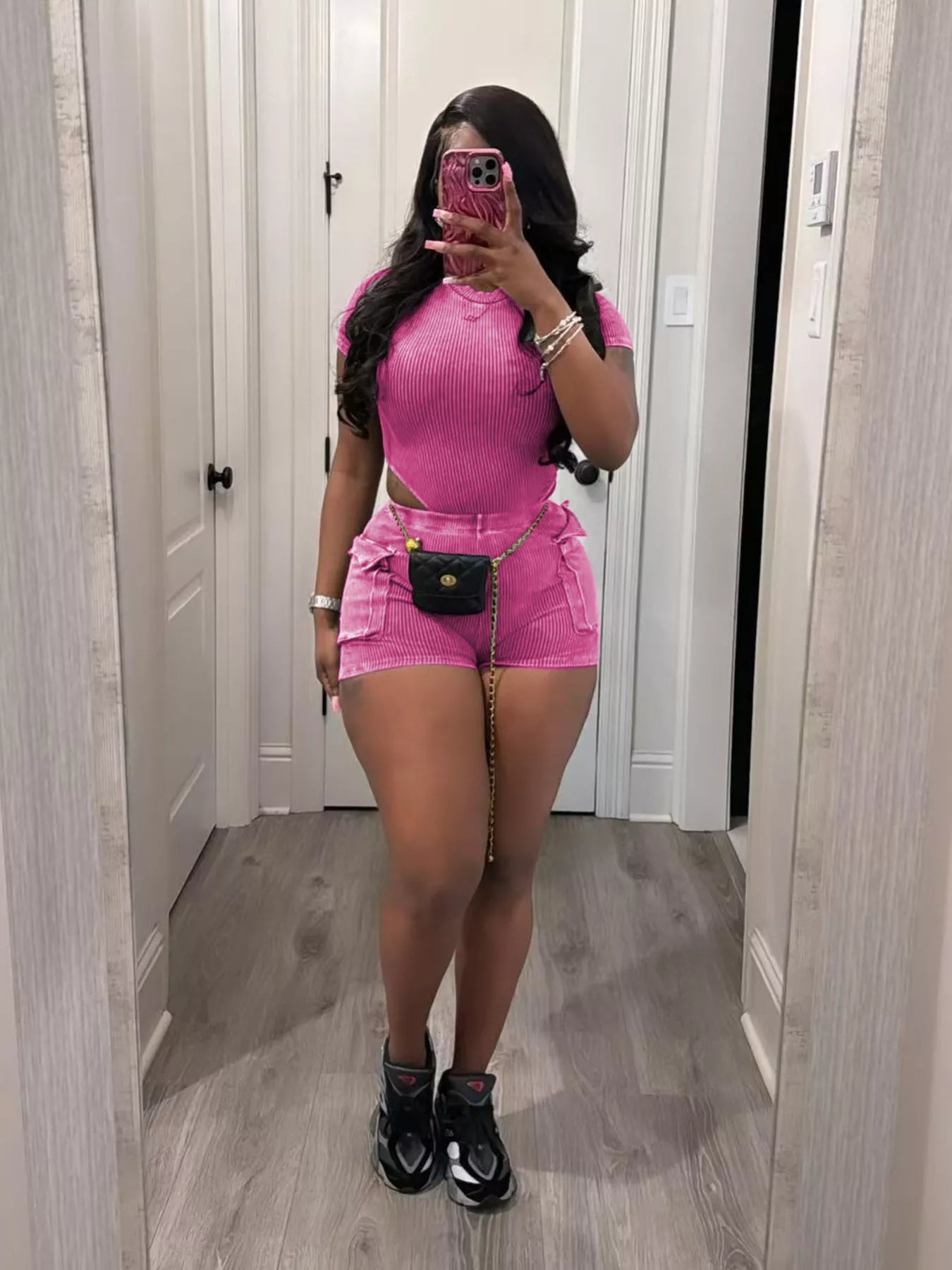Ribbed knit bodysuit and shorts set by Shopimist, featuring a fitted design and textured fabric in a stylish, casual look.