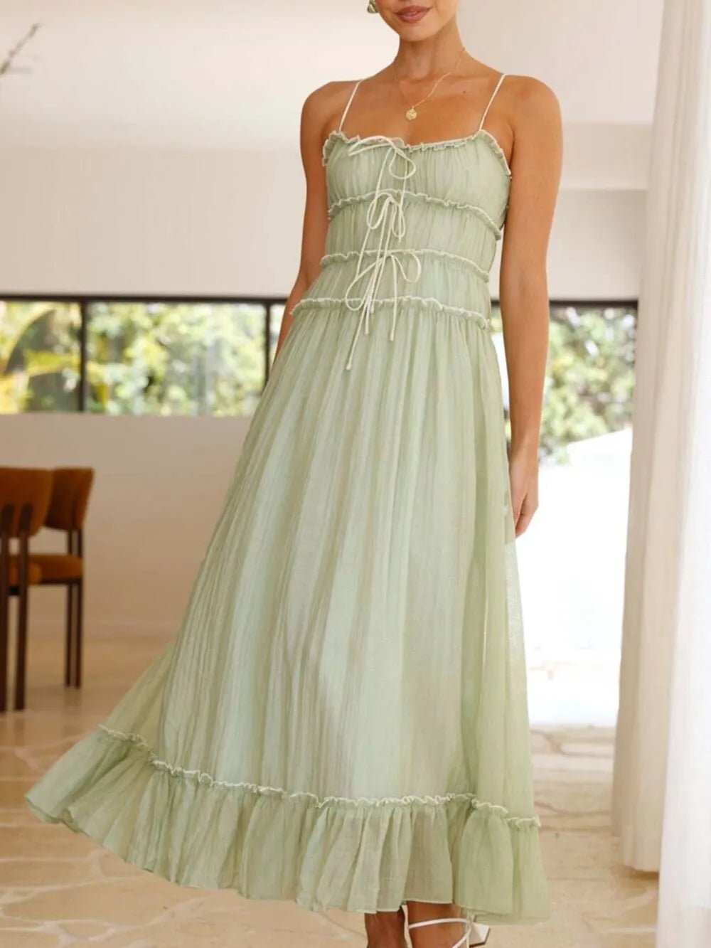 Elegant women's midi cami dress with ruffled hem, featuring a divine frill design, perfect for stylish occasions.