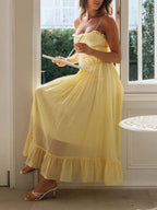 Elegant women's midi cami dress with ruffled hem, featuring a divine frill design, perfect for stylish occasions.
