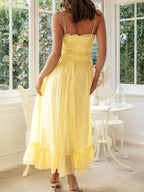 Women's Divine Frill Ruffled Hem Midi Cami Dress by Trendsi, showing the elegant ruffled hem and flowy midi length in a stylish design.