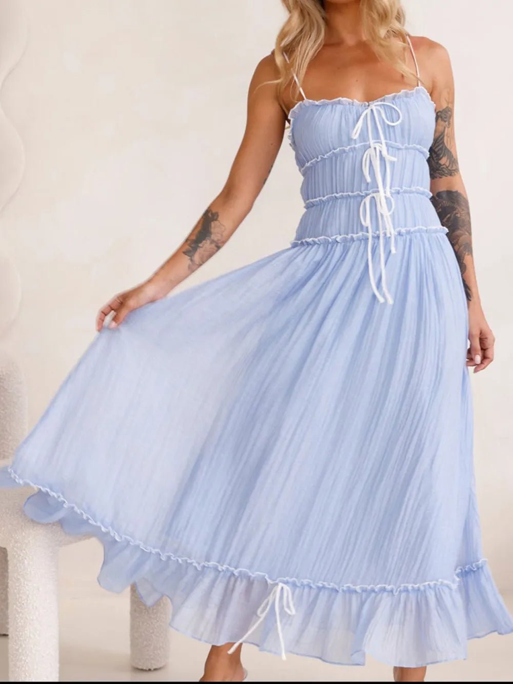Women's Divine Frill Ruffled Hem Midi Cami Dress by Trendsi, featuring a flowing silhouette and elegant ruffle details.