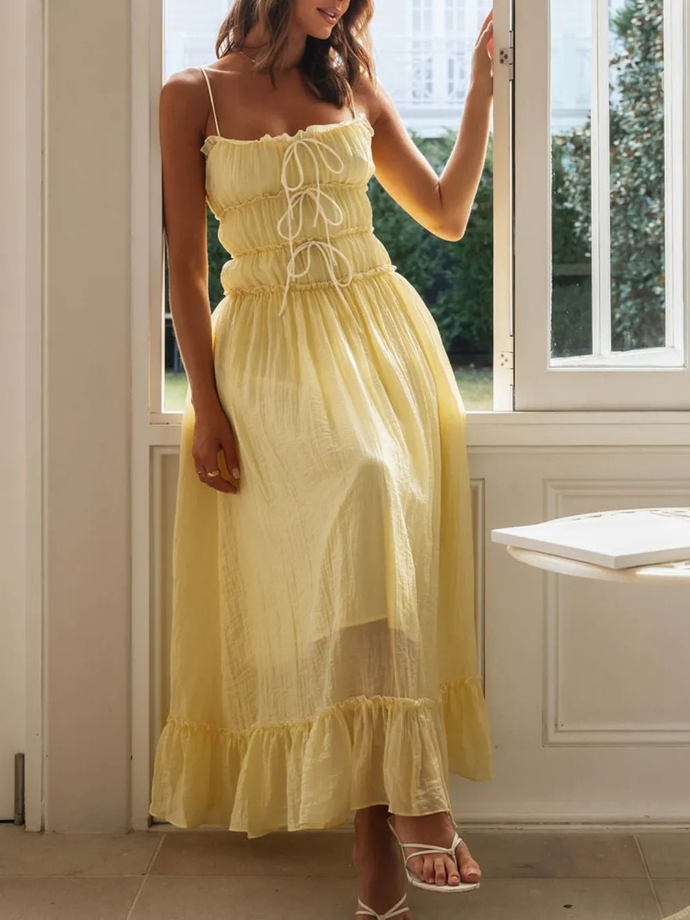 Women's Divine Frill Ruffled Hem Midi Cami Dress by Trendsi, featuring a flowy midi length with frill details and a sleeveless design.