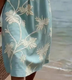 Women's loose fit V-neck dress with coconut print and three-quarter sleeves, perfect for resort casualwear by FitiqueFit.