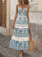 Floral print smocked sweetheart neck maxi dress by Trendsi, lightweight summer dress with a flowing silhouette and vibrant flower pattern.