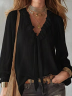 Shopimist ruffle long sleeve blouse with delicate ruffle details and classic fit, shown in a neutral color on a white background.