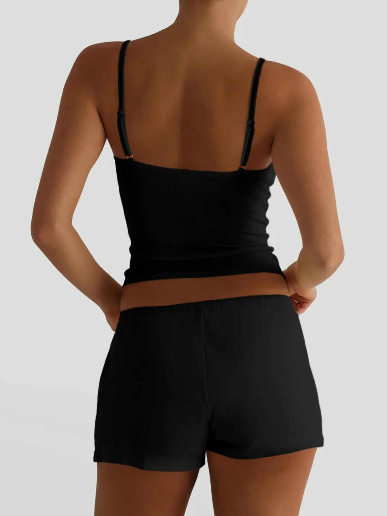 V-neck cami and shorts activewear set by Trendsi, featuring a comfortable fit and stylish design perfect for workouts or casual wear.