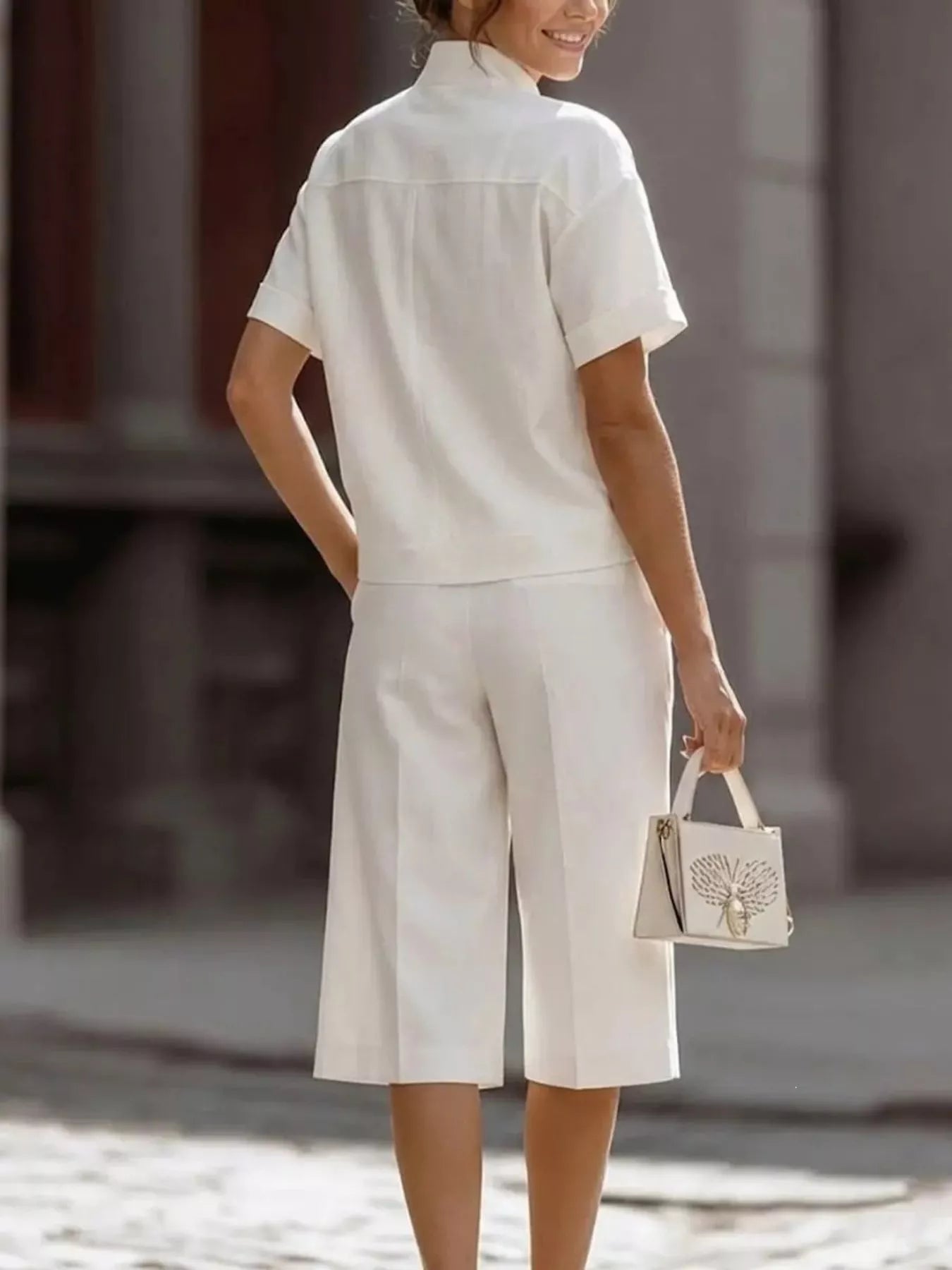 Plus size short sleeve top and wide leg pants set by Plush Fashion Hub, casual comfort, soft fabric, stylish fit.