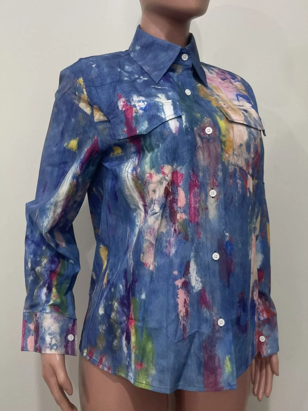 Artistic painted long sleeve denim shirt from Plush Fashion Hub featuring colorful hand-painted designs and casual style.