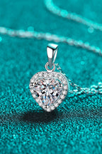 1 Carat Moissanite Heart Pendant Necklace with chain, elegant jewelry by Shopimist, featuring a sparkling heart-shaped moissanite stone.