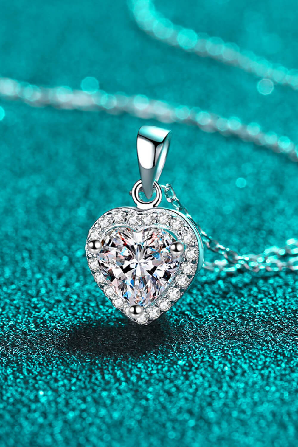1 Carat Moissanite Heart Pendant Necklace with chain, elegant jewelry by Shopimist, featuring a sparkling heart-shaped moissanite stone.