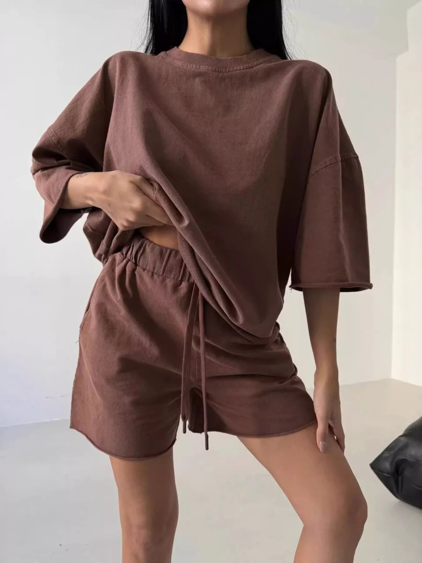 Vintage wash oversized lounge set with tee and shorts from Trendsi, featuring a relaxed fit and casual, comfortable style.