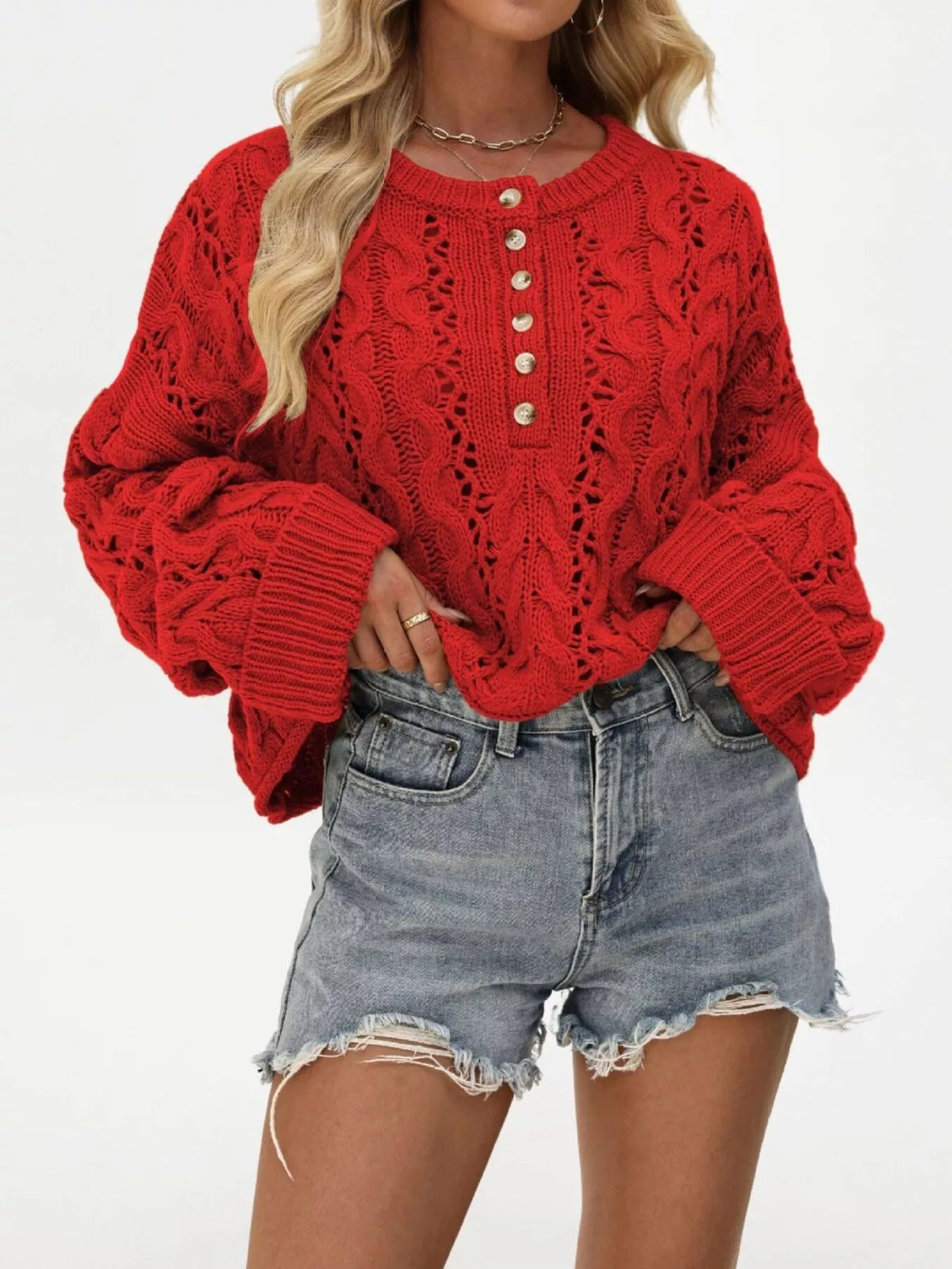 Chic cable knit half-button openwork sweater by Trendsi, featuring textured knit pattern and openwork detailing in a stylish design.