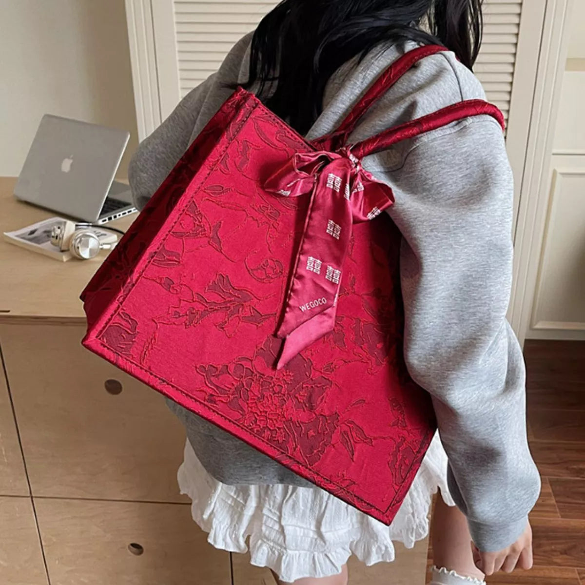 Floral embossed tote handbag with scarf accent from Plush Fashion Hub, featuring textured floral design and stylish accessory.