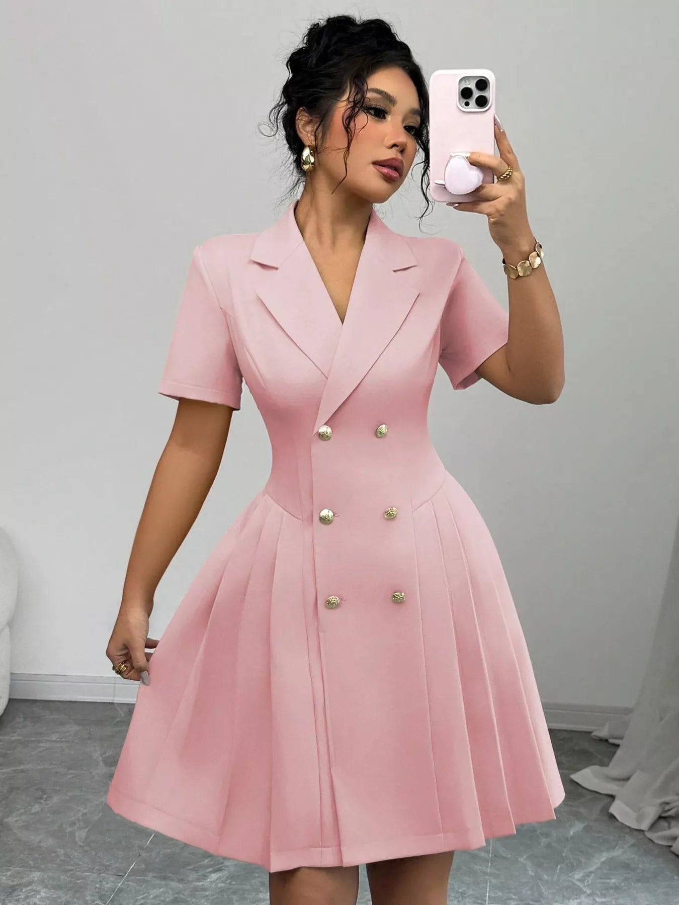 Pleated double-breasted blazer dress by Plush Fashion Hub, featuring structured shoulders and tailored fit, shown on a mannequin.