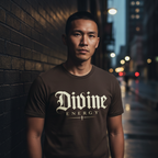 Dark brown Divine Energy T-Shirt by Wear Your Worship featuring Gothic script faith graphic, worn by an Asian male in a city night scene.