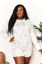 Floral long sleeve top and shorts loungewear set for women, comfortable pajama set with a relaxed fit and vibrant floral pattern.
