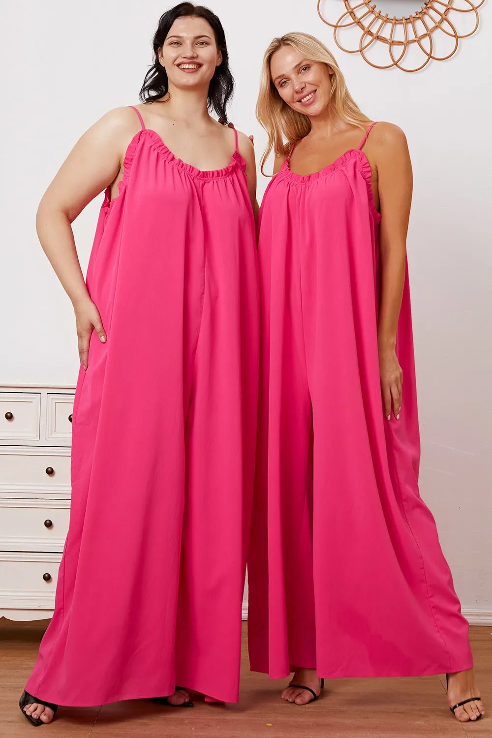 Women’s ruffle trim tie-back cami jumpsuit with pockets, stylish women's apparel by Trendsi, shown in a full-length view.