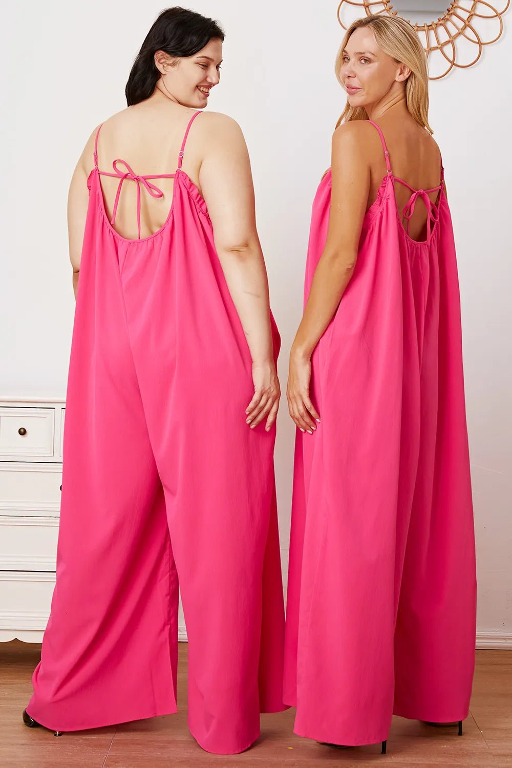 Women's ruffle trim tie-back cami jumpsuit with pockets, stylish women's apparel featuring a flattering fit and feminine details.