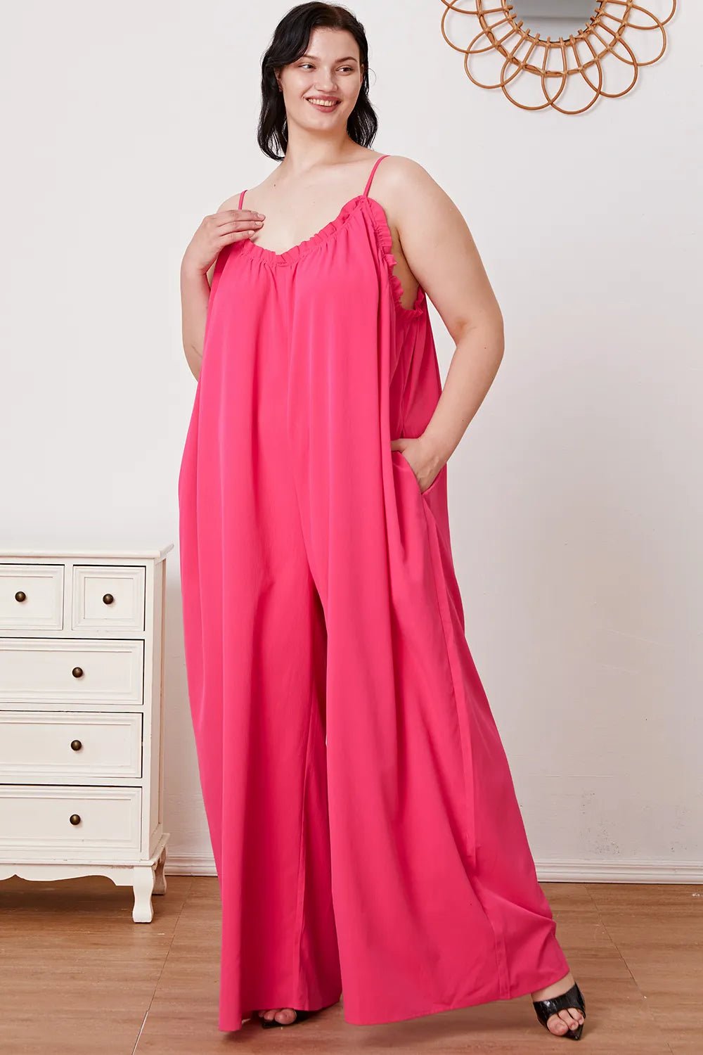 Women's ruffle trim tie-back cami jumpsuit with pockets, stylish women's apparel featuring a flattering fit and feminine details.