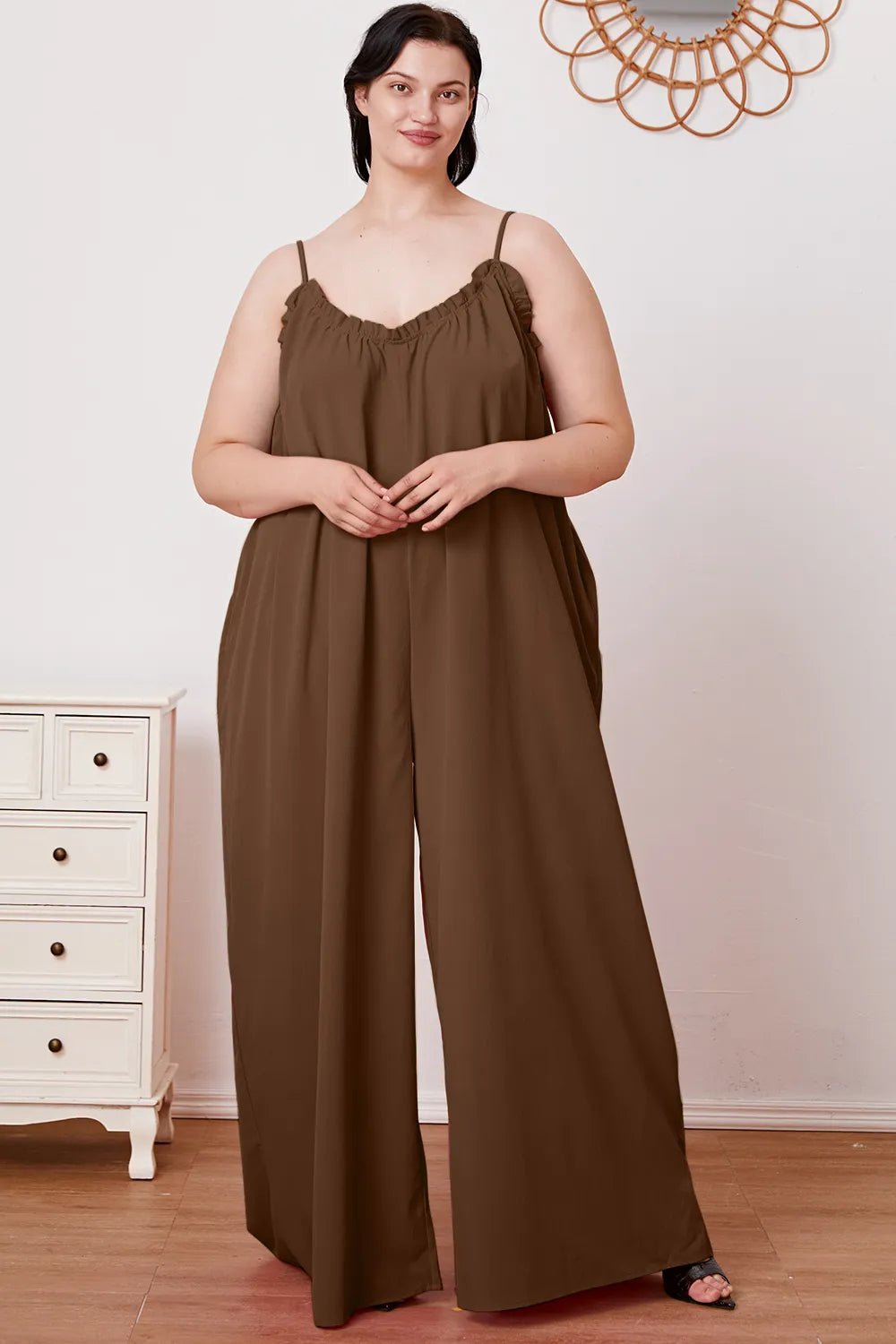 Women's ruffle trim tie-back cami jumpsuit with pockets, fashionable women's apparel featuring a flattering silhouette and stylish details.
