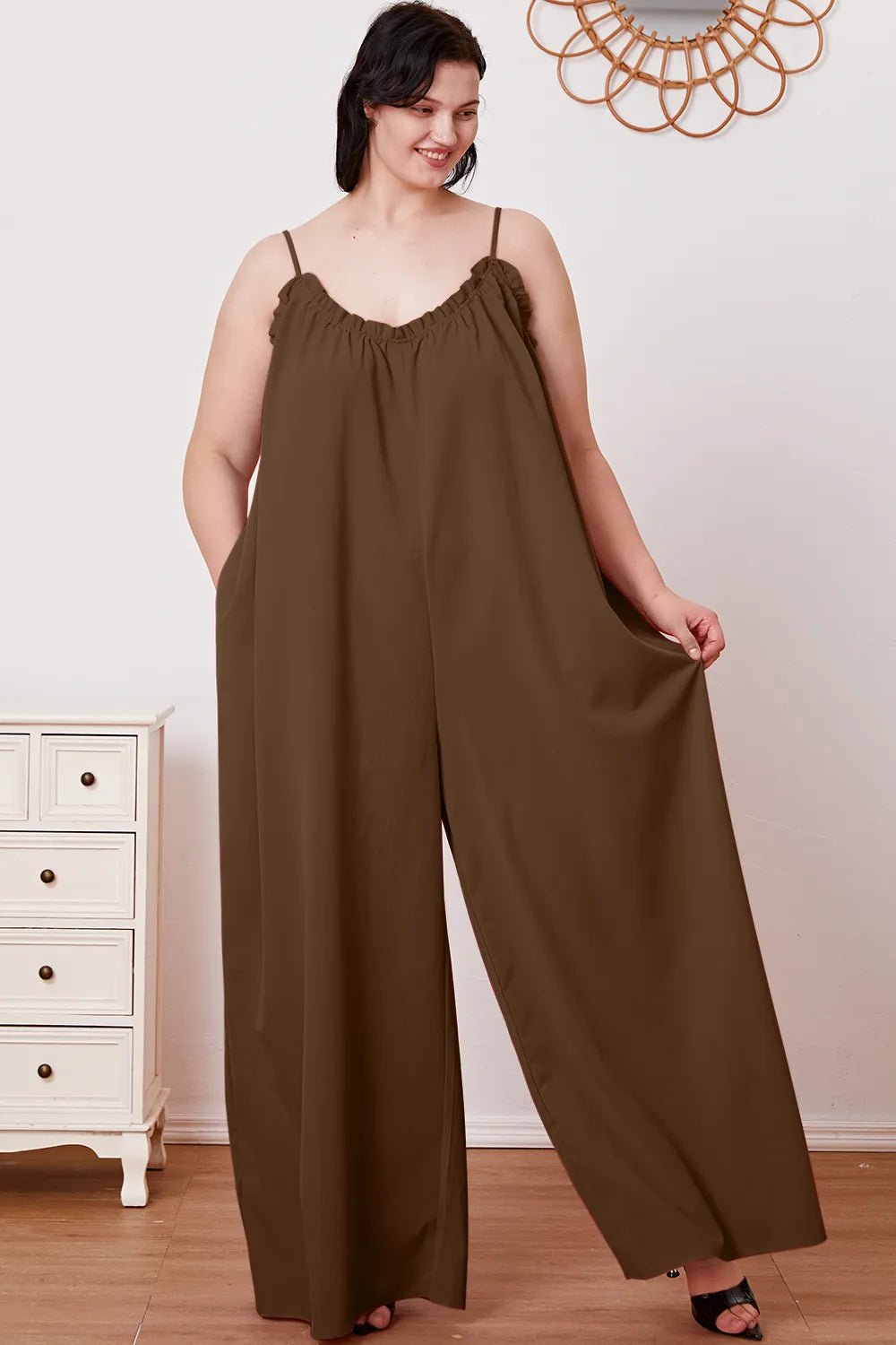Women's ruffle-trim tie-back cami jumpsuit with pockets, trendy women's apparel featuring a stylish design and comfortable fit.