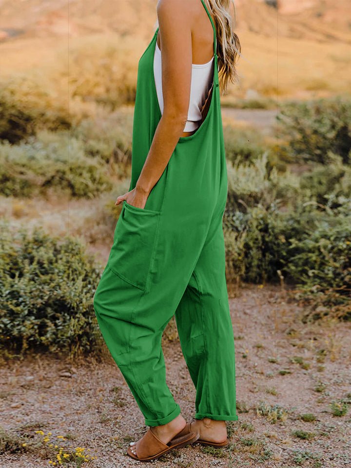 Women's sleeveless V-neck wide-leg jumpsuit with pockets, stylish and comfortable, by Trendsi, shown in full length.