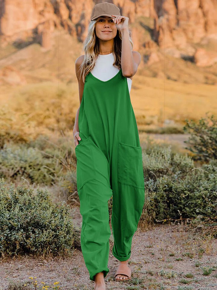 Women's sleeveless V-neck wide-leg jumpsuit with pockets, stylish and comfortable women's apparel by Trendsi.