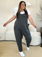 Women's sleeveless V-neck wide-leg jumpsuit with pockets, stylish women's apparel by Trendsi, shown in full length.